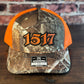 1517 Realtree and Orange Trucker