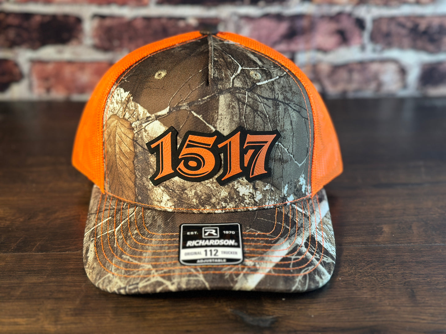 1517 Realtree and Orange Trucker