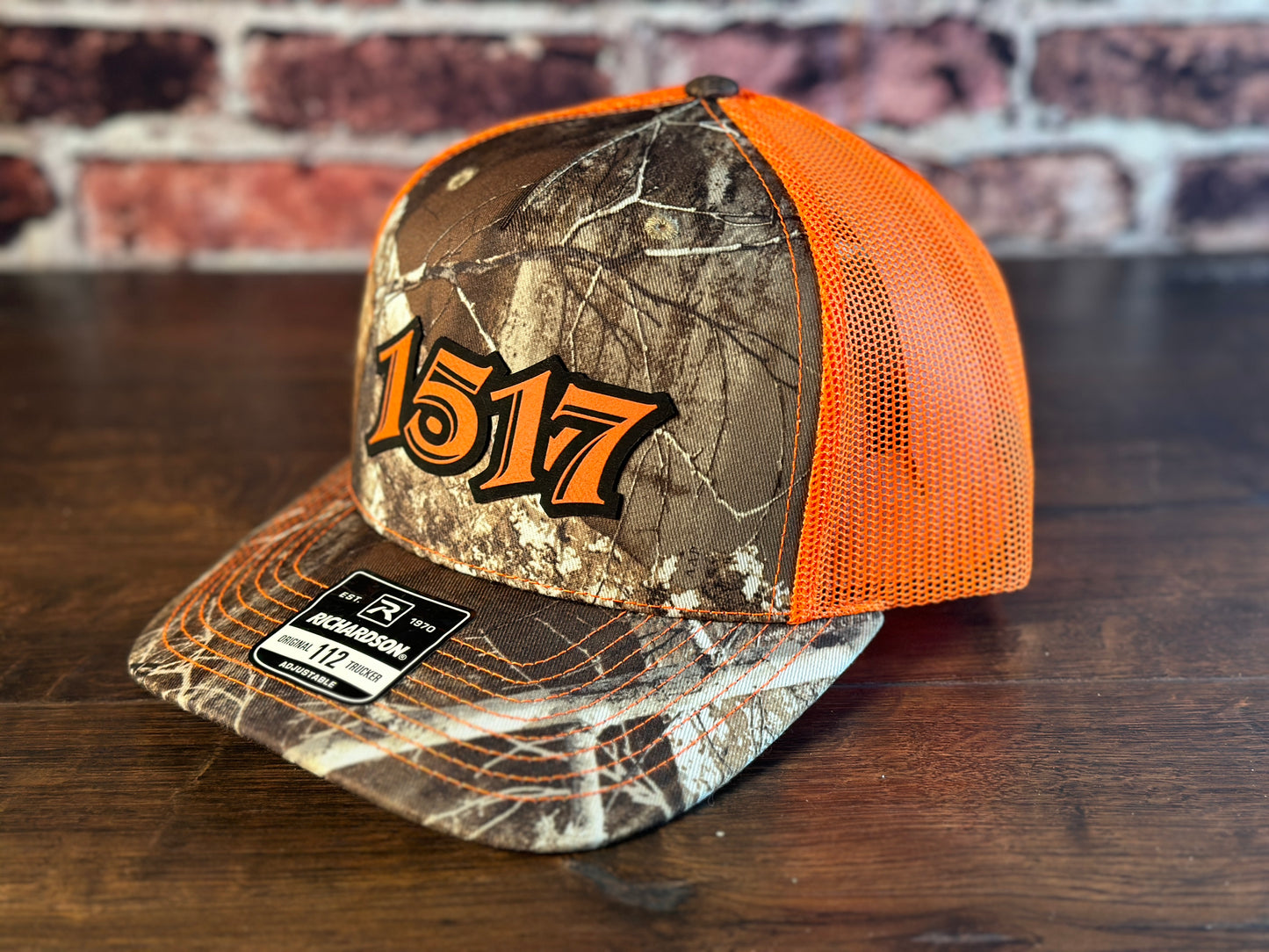 1517 Realtree and Orange Trucker